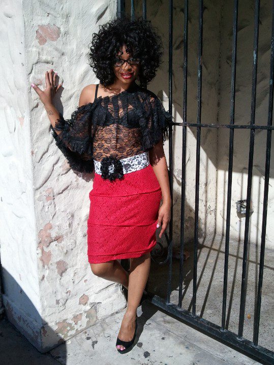 Female model photo shoot of RudeElegance in Ybor city Tampa, Fl, hair styled by Kanisha Mallea