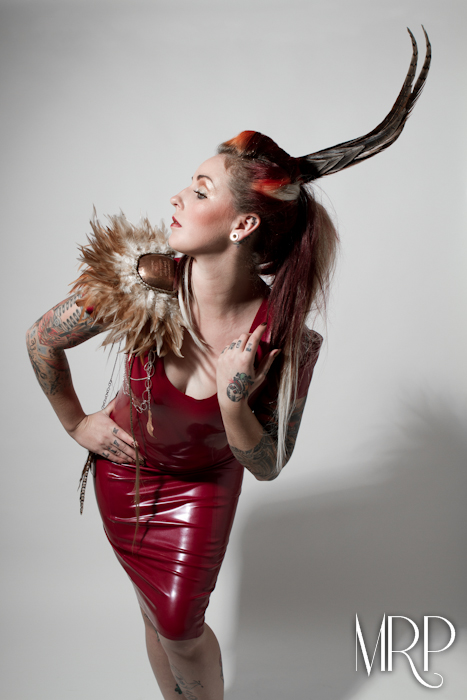 Female model photo shoot of Ms Moo Make Up and Aisling Grace by Miss Rain in Nottingham, UK, clothing designed by Cathouse Latex