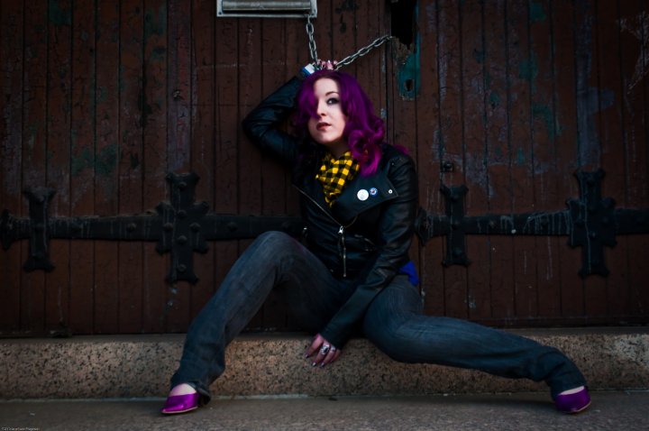 Female model photo shoot of Violet Vicious in abandond armory