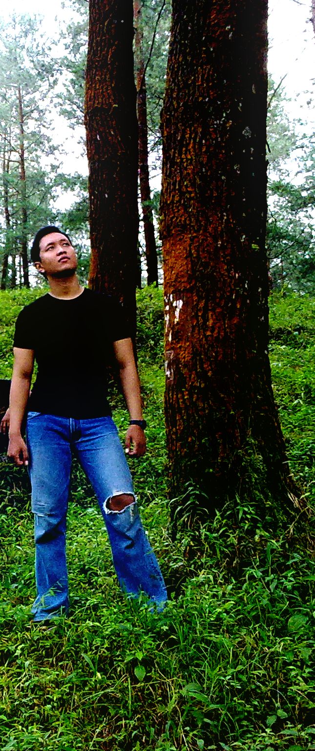Male model photo shoot of Satrio Raphael in Baturaden Conservational Forestpark