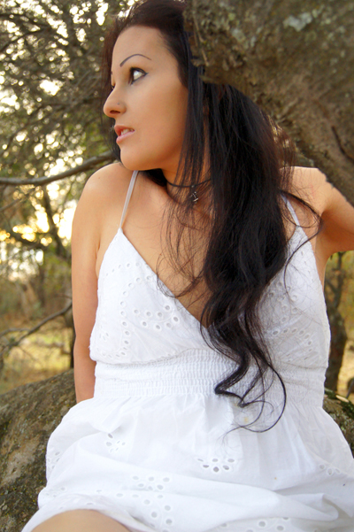 Female model photo shoot of Lilliana S in Sierra NV Mountains