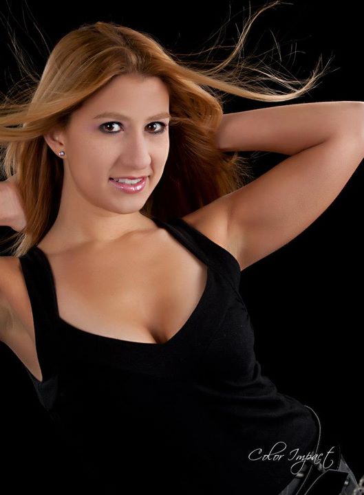 Female model photo shoot of figure skater Katie by Color Impact  