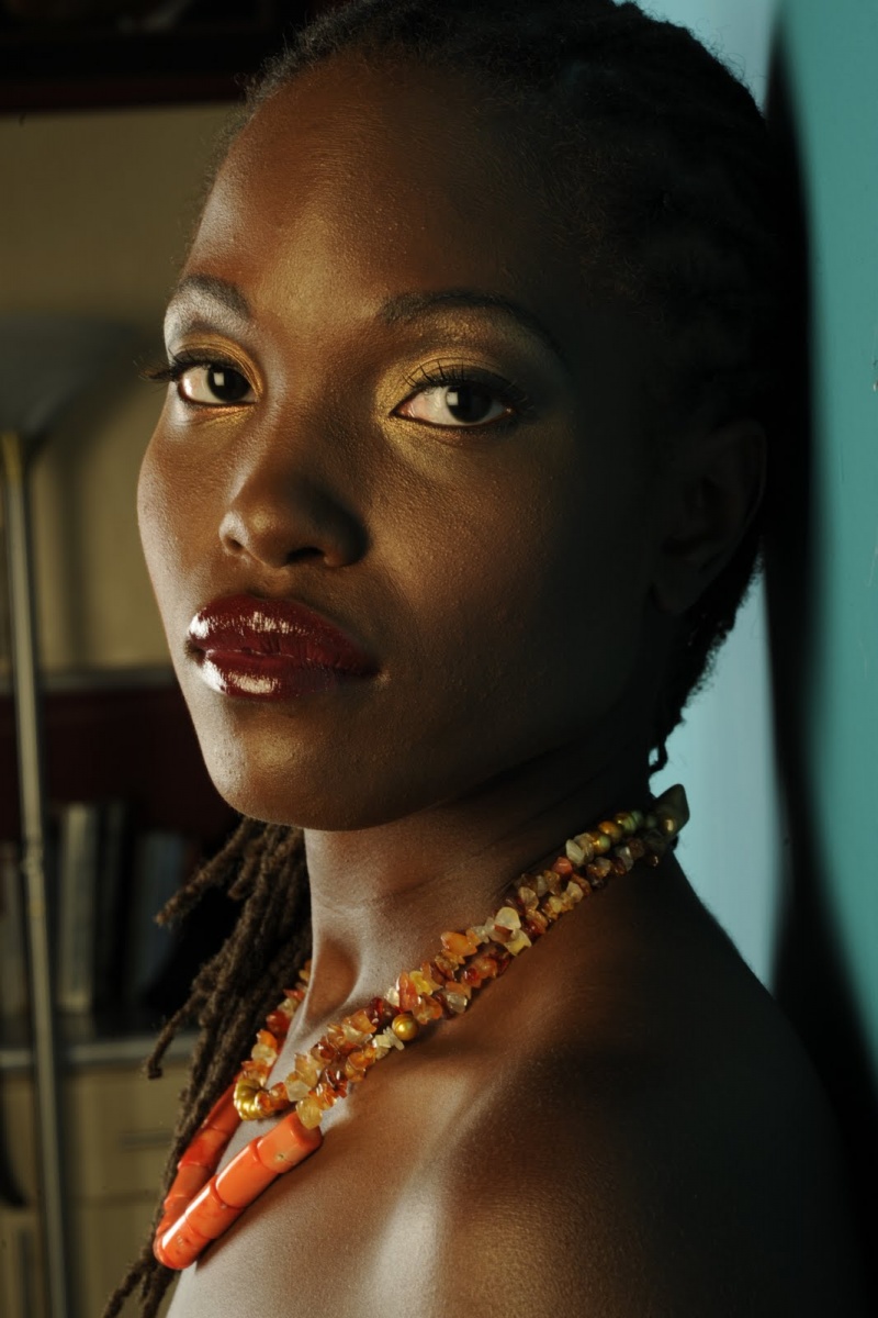 Female model photo shoot of Nzingah by Black Girls Rule
