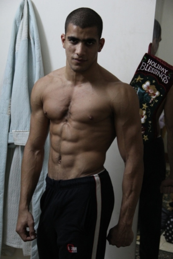 Male model photo shoot of Ahmed yahia in gym