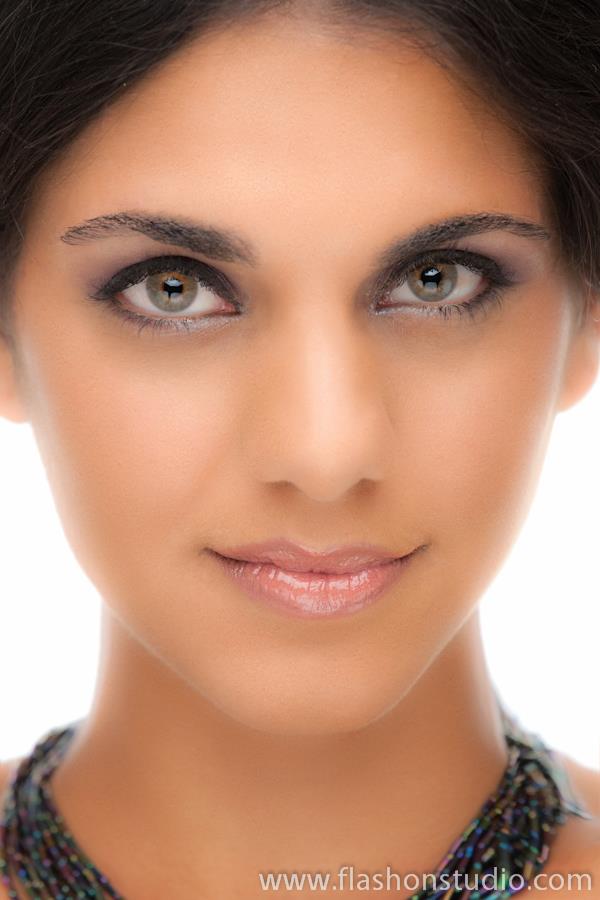 Female model photo shoot of amar by Flashon Studio, makeup by Magda Beltran