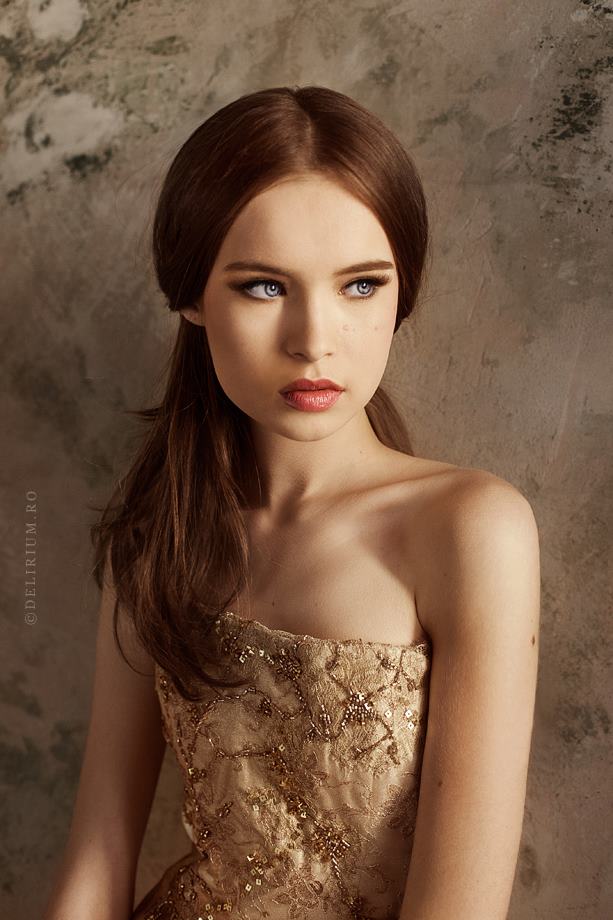 Female model photo shoot of Georgiana Ionita MUA by Andreea Retinschi