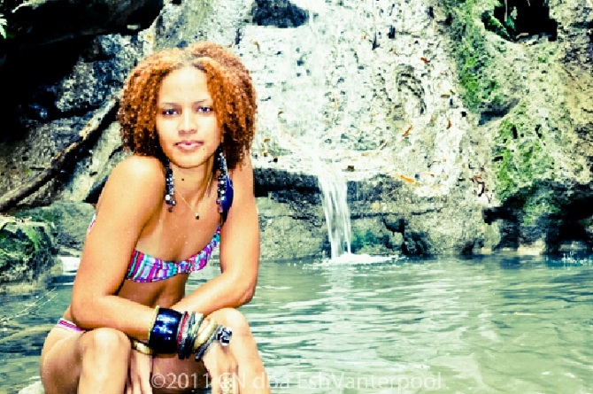 Female model photo shoot of VayVoE  in St. Croix Rainforest