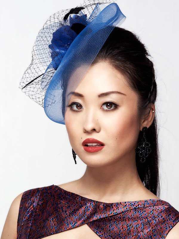 Female model photo shoot of D-DAH Makeup Artistry  and Nouveau XL by John Ng