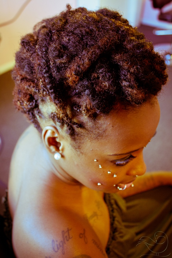 Female model photo shoot of Sankofa Pictures, hair styled by EdensCornerHairSalon