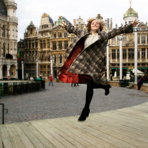 Female model photo shoot of Weathervane in Grand Place, Brussels