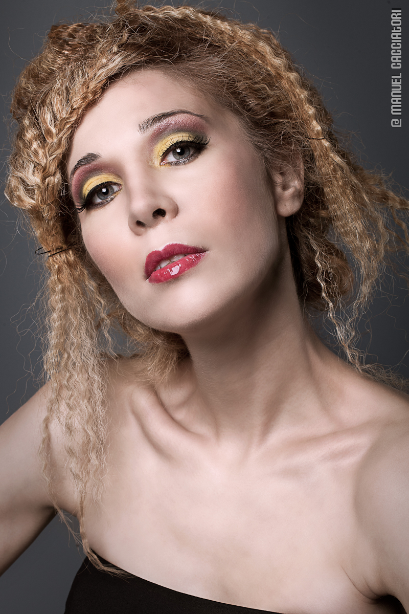 Female model photo shoot of ApolloniaMakeup in Milan