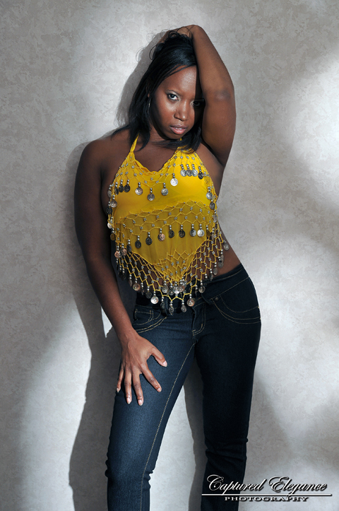 Female model photo shoot of Javay by Captured Elegance in winter park fl, hair styled by Christys Cuts