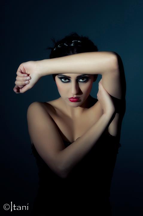 Female model photo shoot of Coshi Makeup Artist