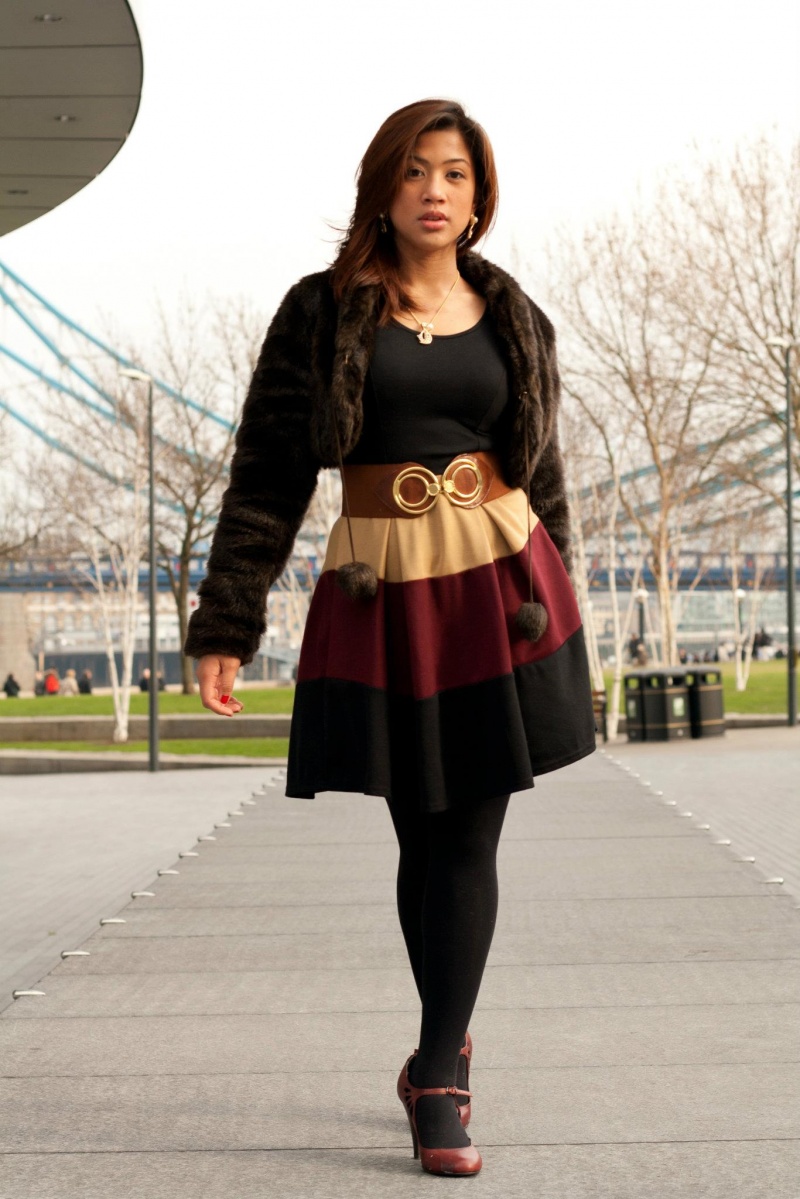 Female model photo shoot of Rozelyn Joaquin in Tower Bridge, London
