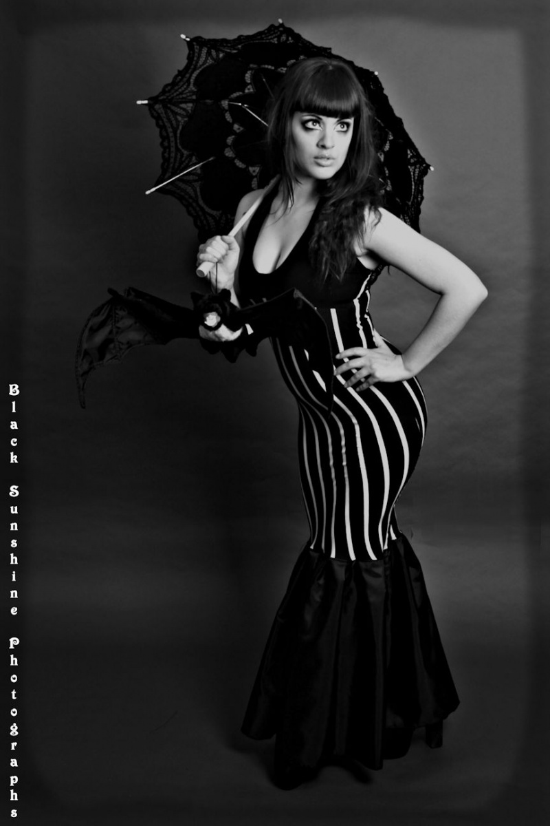 Female model photo shoot of Black Sunshine Clothing by Black Sunshine Photos in Black Snnshine Studio