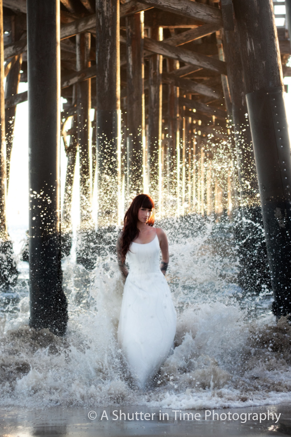 Female model photo shoot of A Shutter in Time Photo in Seal Beach Pier