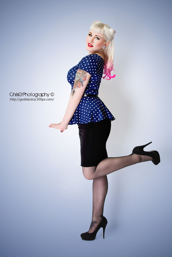 Female model photo shoot of Kelli Schlenker by ChrisG Photography, hair styled by Keanna K Hair Stylist