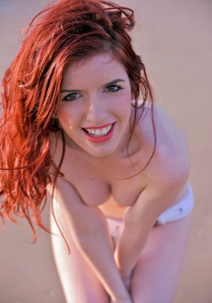 Female model photo shoot of Alex Mealand in Formby beach.