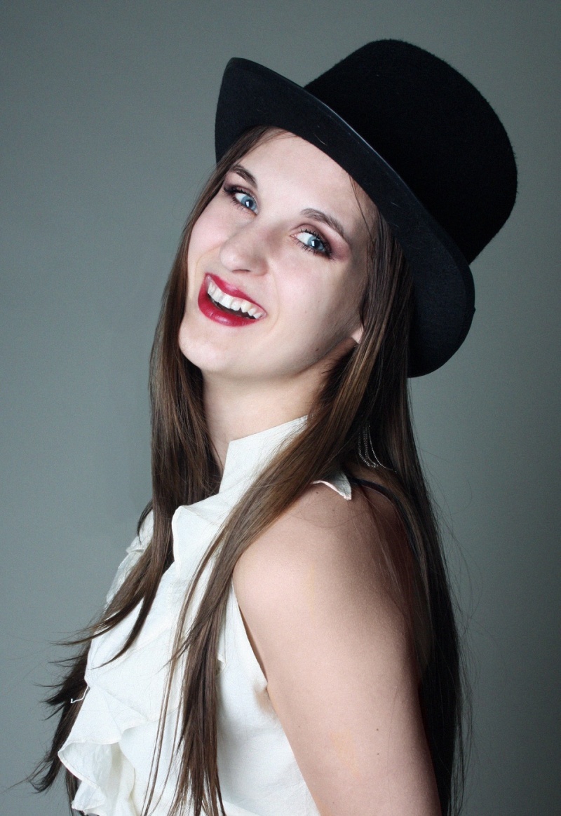 Female model photo shoot of Garnet Star by Miss B Marie, makeup by Roezi Rebel