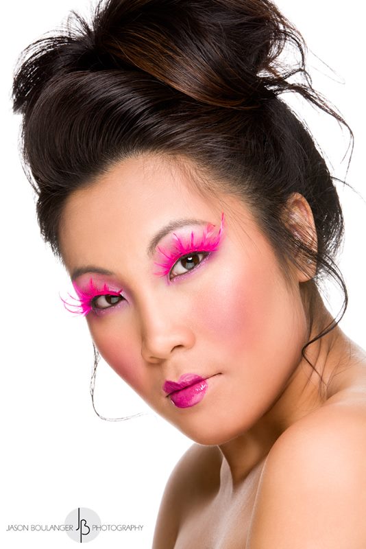 Female model photo shoot of Trendy Makeup Bag