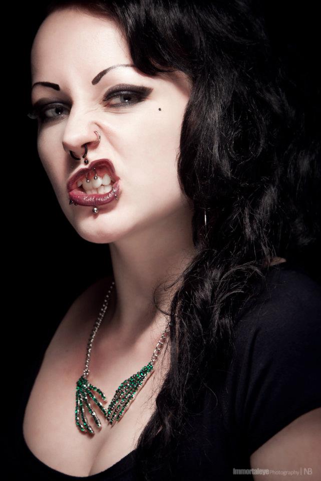 Female model photo shoot of Lucy Von Zombie by Nils Bratby in Immortaleye studio, hair styled by Emma Stroud HairMUA