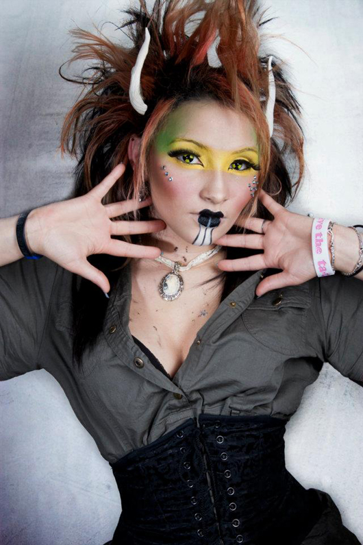 Female model photo shoot of Niishie Elf, makeup by Deivyd Leigh Shockk