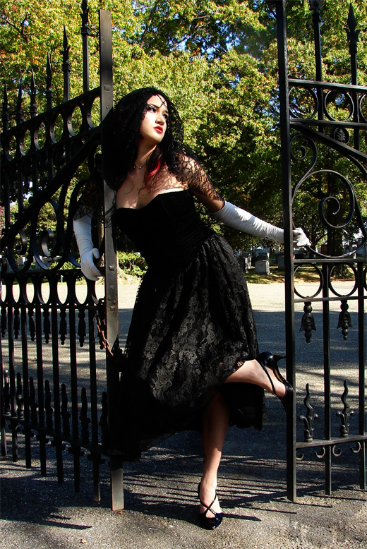 Female model photo shoot of Madame Black Photograph and Sparks in Rockland Cemetery, DC