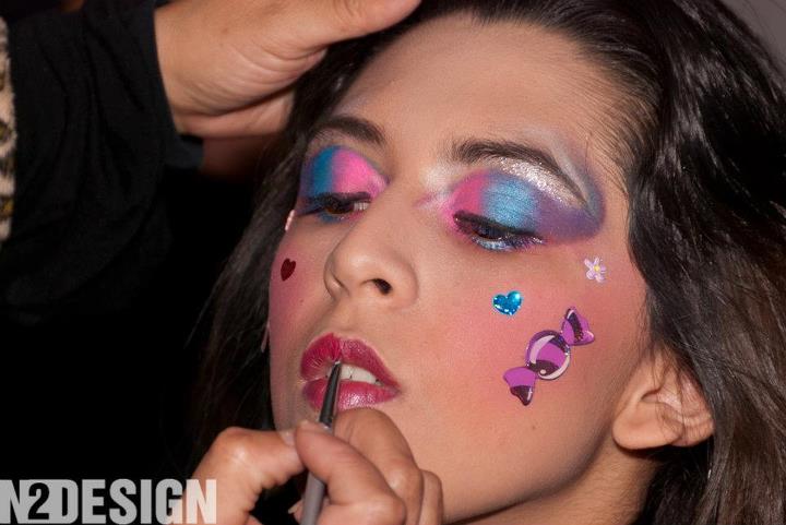 Female model photo shoot of makeup artist