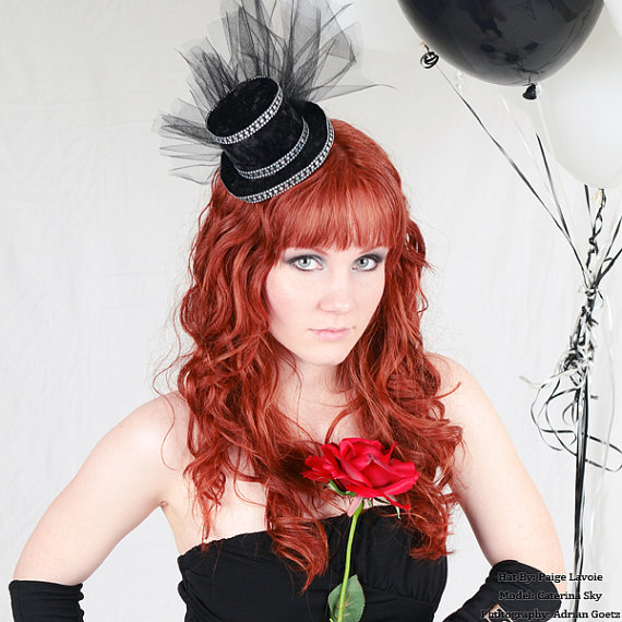 Female model photo shoot of Kaitlin Marie, clothing designed by Hats by Paige Lavoie 