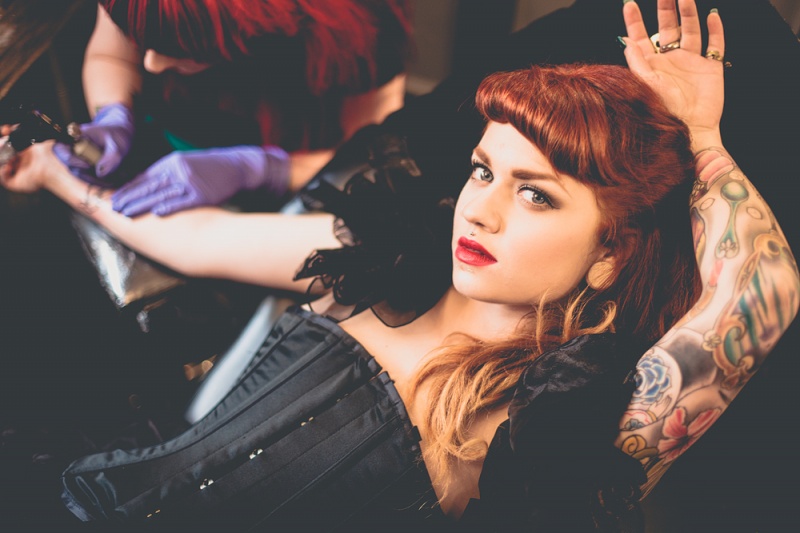 Female model photo shoot of Sophie Cash by Walker and Walker in Black Lantern Tattoo Studio