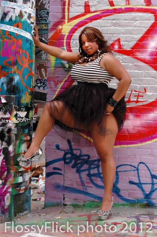 Female model photo shoot of juicey k the model in grafitti warehouse