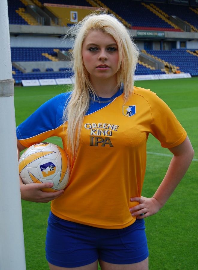Female model photo shoot of Bethany Leah in Mansfield Town FC ground