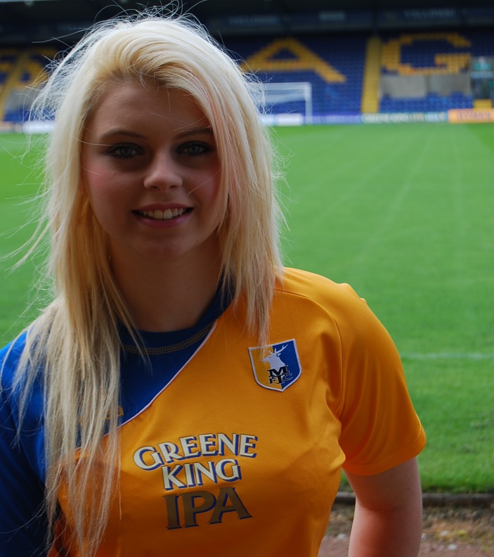 Female model photo shoot of Bethany Leah in Mansfield Town FC ground
