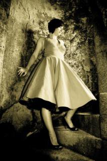 Female model photo shoot of Faye  in Slains Castle, Aberdeenshire