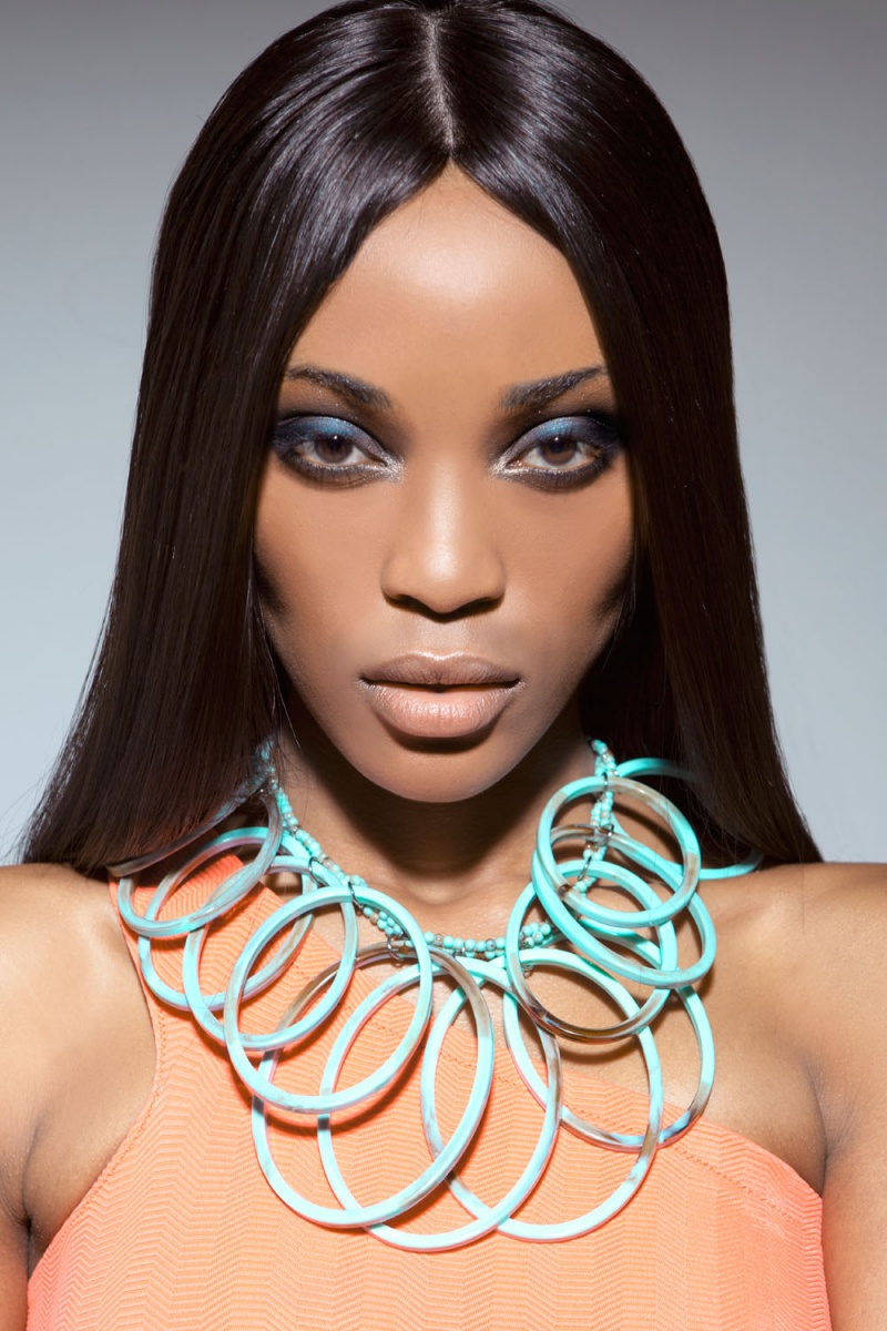Female model photo shoot of Petit-Petion Hair in Long Island NY