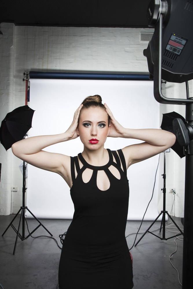 Female model photo shoot of Emily Cornwell in studio