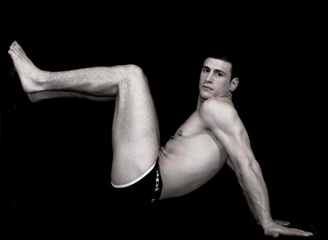 Male model photo shoot of Krys Toxic-Lopez in Dark Room