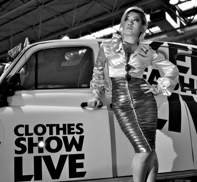 Female model photo shoot of Caroline Baldry in The NEC Birmingham, clothing designed by Eustratia