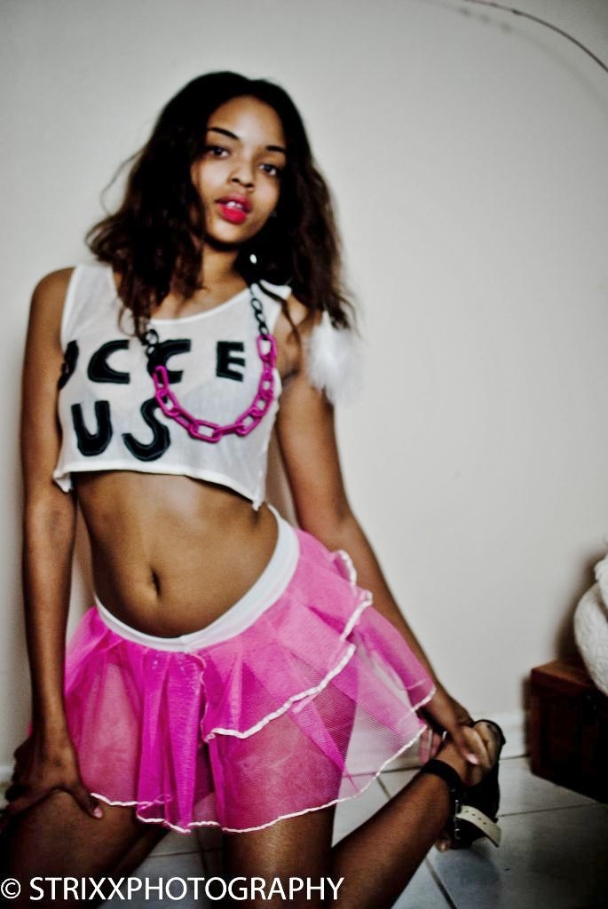 Female model photo shoot of Chyna Rae by Strixx, clothing designed by Occeus Cout