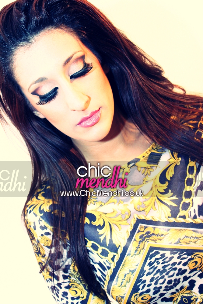 Female model photo shoot of Chic Mendhi