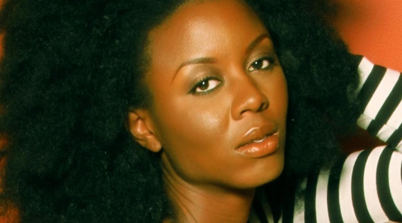 Female model photo shoot of Ngozi Elo by Thomas A Mobley