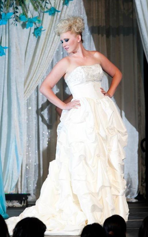 Female model photo shoot of Mallory Hines in International Wedding Festival by California Bridal Events