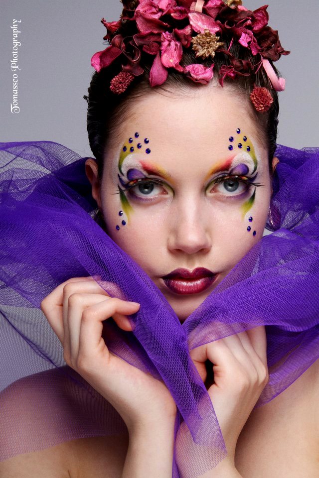 Female model photo shoot of Sany makeup
