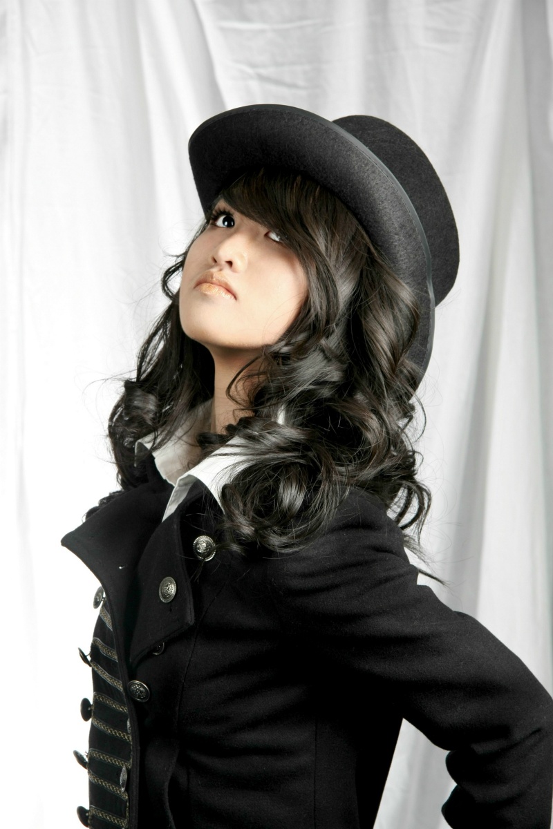 Female model photo shoot of Xstine in Utopia Hair Academy