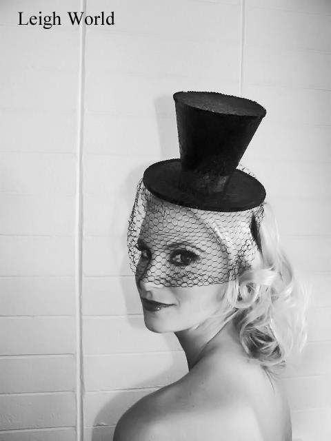 Female model photo shoot of Britnee Miller in White Lotus Welness Center, makeup by Leigh World Art