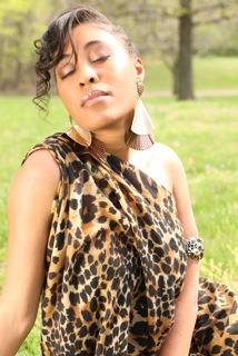 Female model photo shoot of Aziza_LadiLynn22