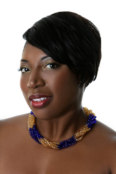 Female model photo shoot of omoYenis jewelry 