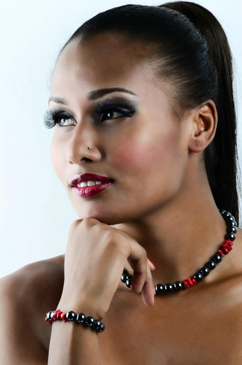 Female model photo shoot of omoYenis jewelry  in www.omoyeni.co