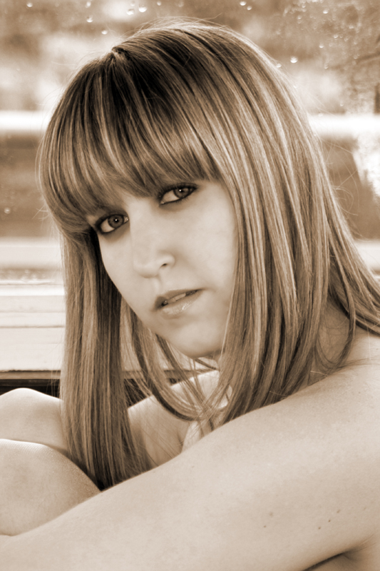 Female model photo shoot of Lottie Wilkin by artimagesof in Bangor Pier