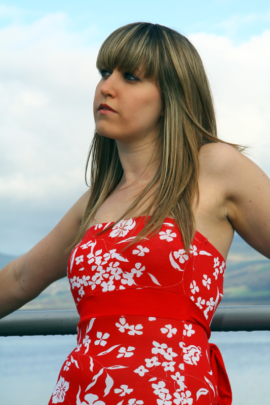 Female model photo shoot of Lottie Wilkin by artimagesof in Bangor Pier